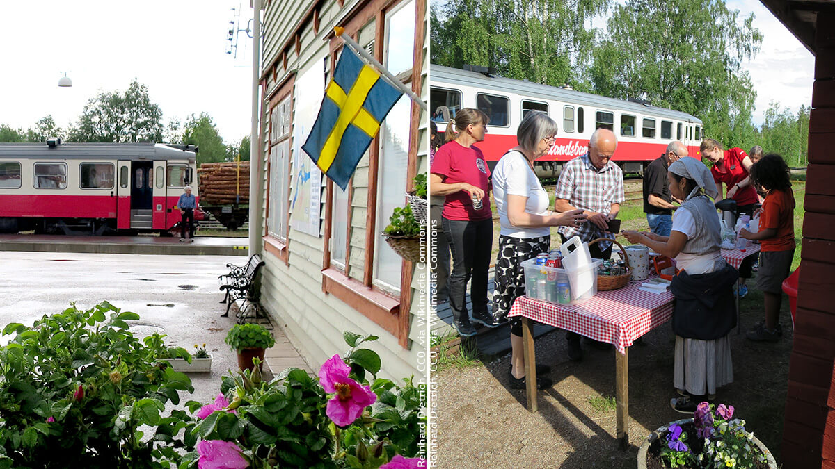 Schwedens Inlandsbanan, eine Gruppe Menschen steht vor einem Bahnhof und kauft Snacks ein