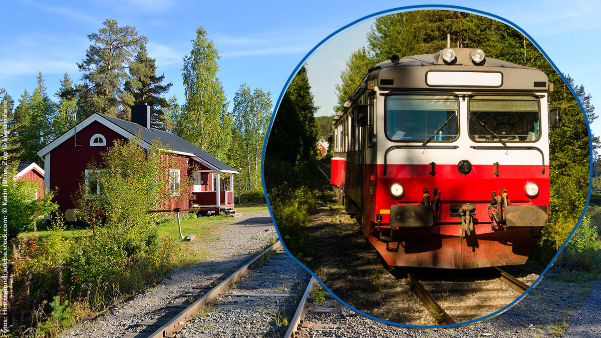 Schwedens Inlandsbanan Zug fährt auf einer Strecke neben einem Bahnhof